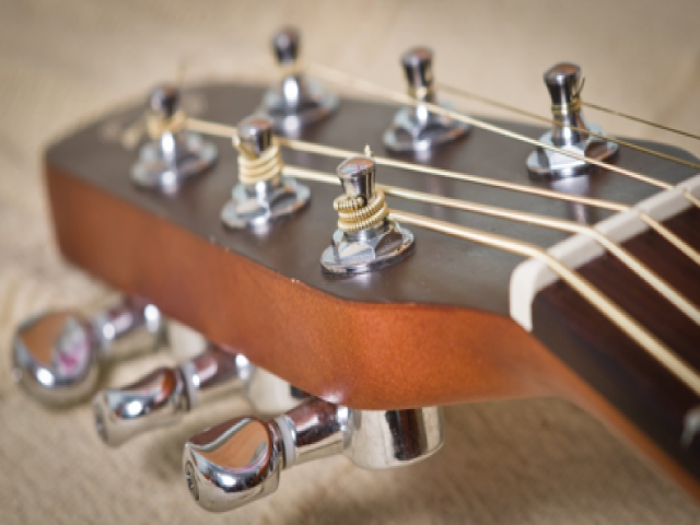 Think of a chiropractic adjustment as “tuning” the strings of a guitar. Delicate corrections are required to create the perfect tone.